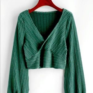 Cable knit surplice cropped sweater